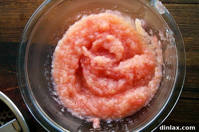 Homemade applesauce made with unpeeled apples, a natural and comforting side dish for Thanksgiving.