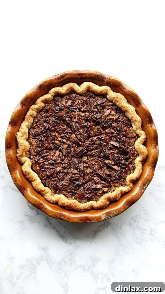 Naturally Sweet Bourbon Pecan Pie 17 A freshly baked Bourbon Pecan Pie, golden brown and glistening, cooling on a wire rack.