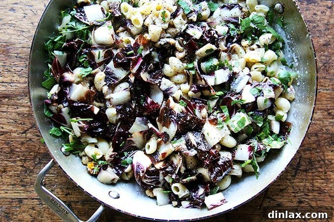 Close-up of a bowl of radicchio pasta, showcasing the rich texture and vibrant colors.