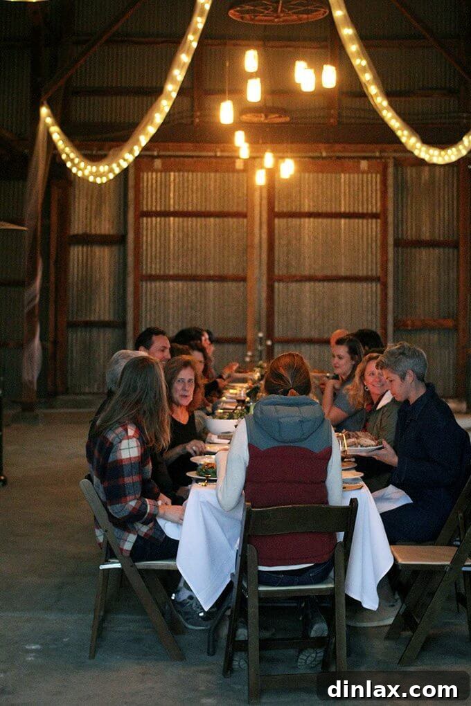 California Olive Ranch The 2017 Olive Harvest 17 A vibrant sunset casting a warm glow over a Californian landscape, possibly an olive grove at dusk.