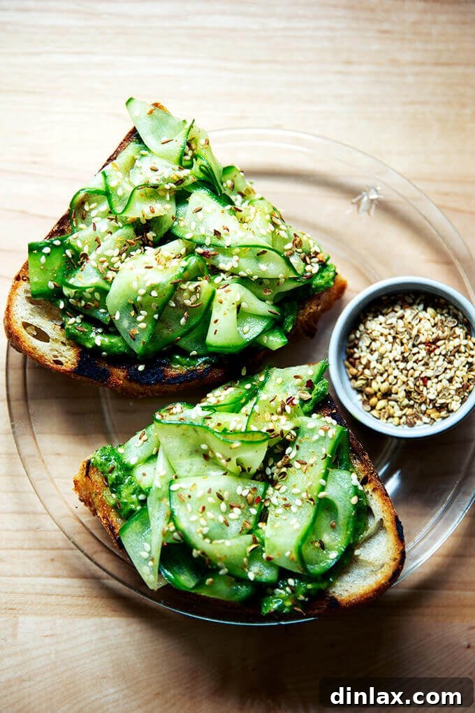 Crunchy Nut-Free Dukkah Blend 11 Cucumber toasts topped with a vibrant green sauce and a sprinkle of nut-free dukkah.