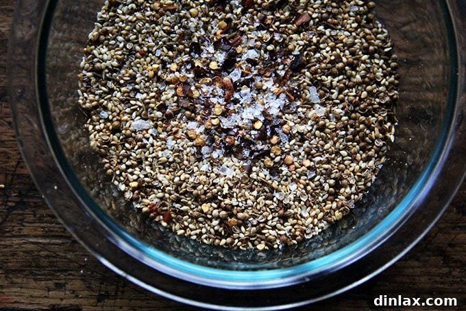 Crunchy Nut-Free Dukkah Blend 6 A small bowl filled with freshly made nut-free dukkah, ready to be served.