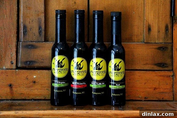 A selection of local food gifts including olive oil, salsa, and chocolate from Capital Region businesses