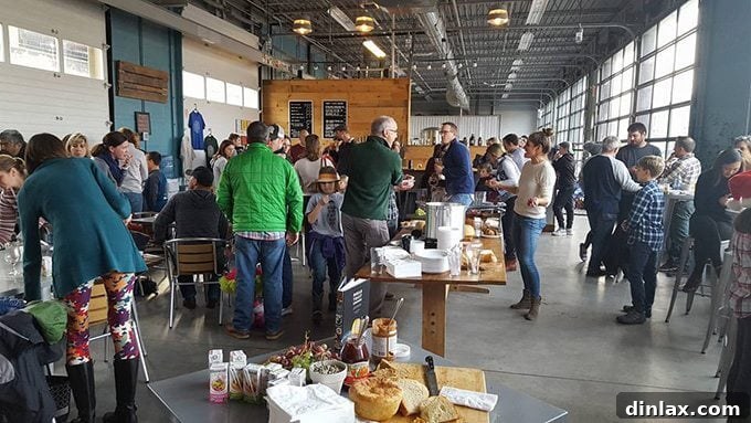 People enjoying freshly brewed beer at Great Flats Brewing, a lively local spot