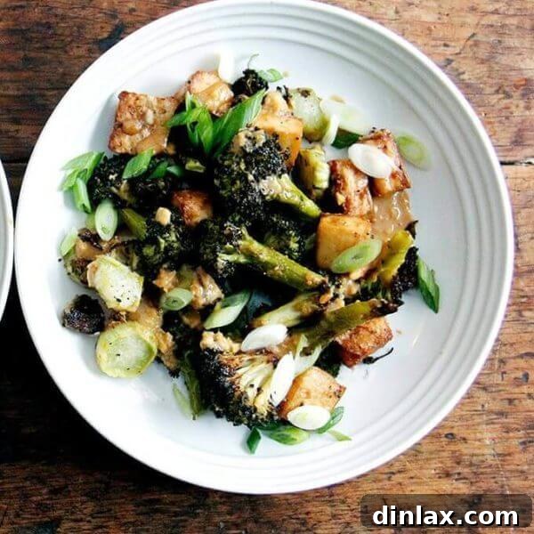 Crispy Tofu and Broccoli with Sesame-Peanut Pesto, a healthy and easy plant-based dinner recipe from Smitten Kitchen Every Day.