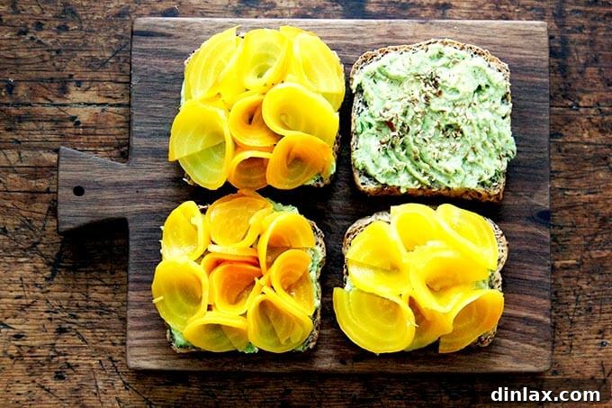 Toasted bread slices topped with beet "roses" or "horns" made from twisted beet slices.