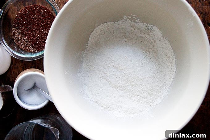 Golden Quinoa Flax Toast 3 All the dry and wet ingredients for Quinoa Flax Toasting Bread laid out on a counter.