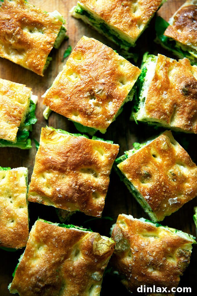 Delicious focaccia slab sandwiches, filled and ready to serve.