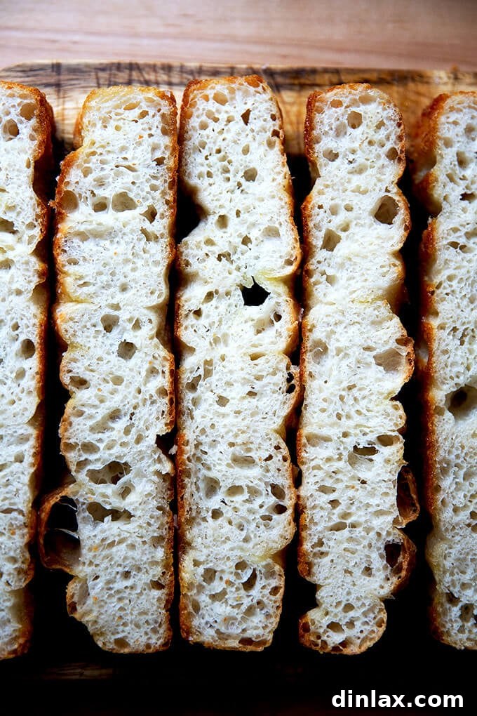 A second close-up crumb shot of freshly baked focaccia, showcasing its airy texture.
