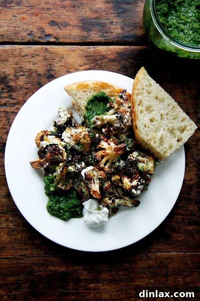 Completed roasted cauliflower dish with bread for serving