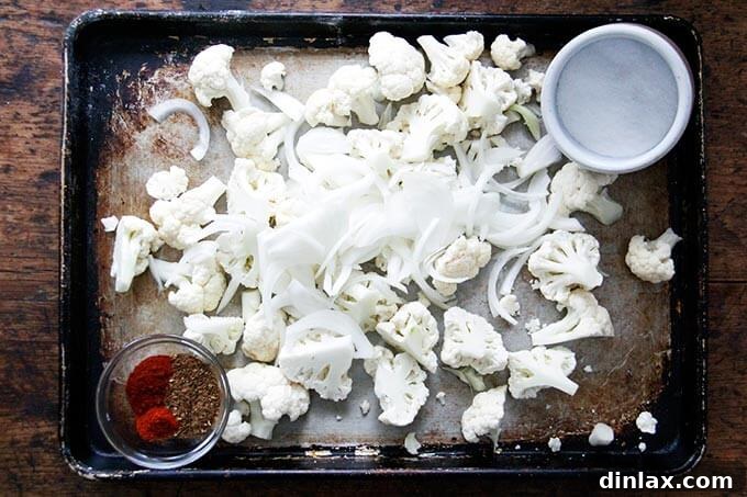 Cauliflower and onions seasoned with spices and olive oil