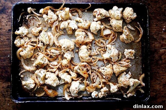 Close-up of seasoned cauliflower ready for roasting