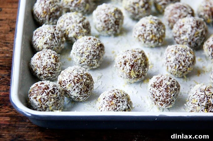 Zesty Lemon Coconut Date Bites 12 A tray of lemon coconut date balls.