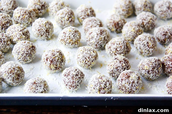 Zesty Lemon Coconut Date Bites 13 A tray of lemon coconut date balls.