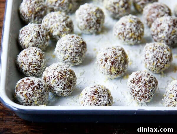 A tray of lemon coconut date balls.