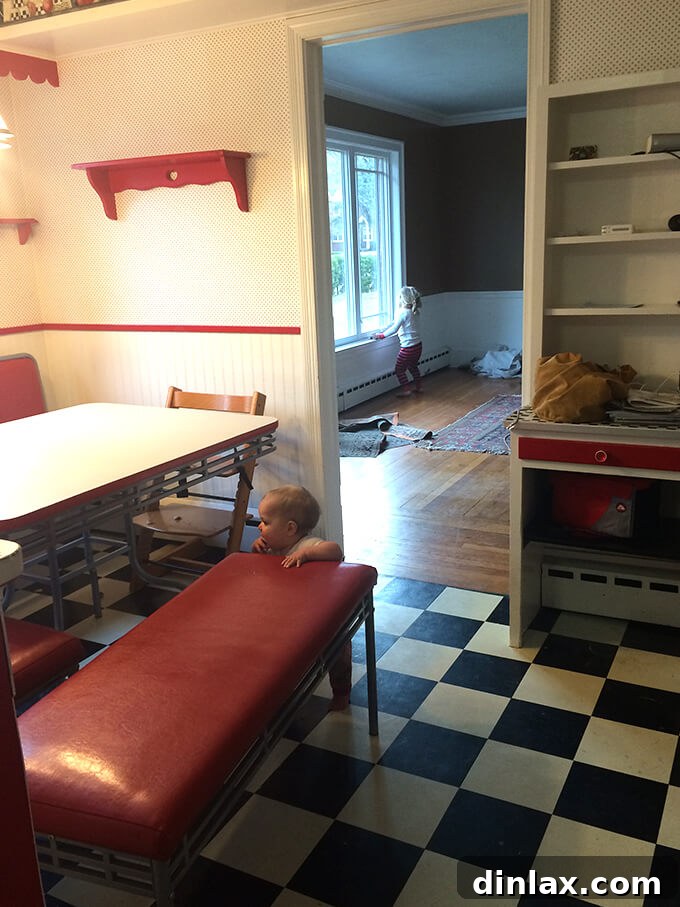 Our original kitchen with the red vinyl banquet, a central piece for five years. Before Kitchen Tour: Red Vinyl Banquet and Original Layout