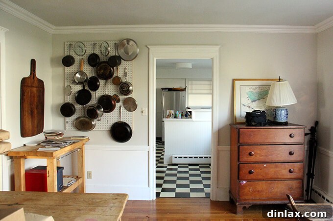 Children's joyful presence brightens the old kitchen space. Kids playing near the kitchen, adding warmth to the space