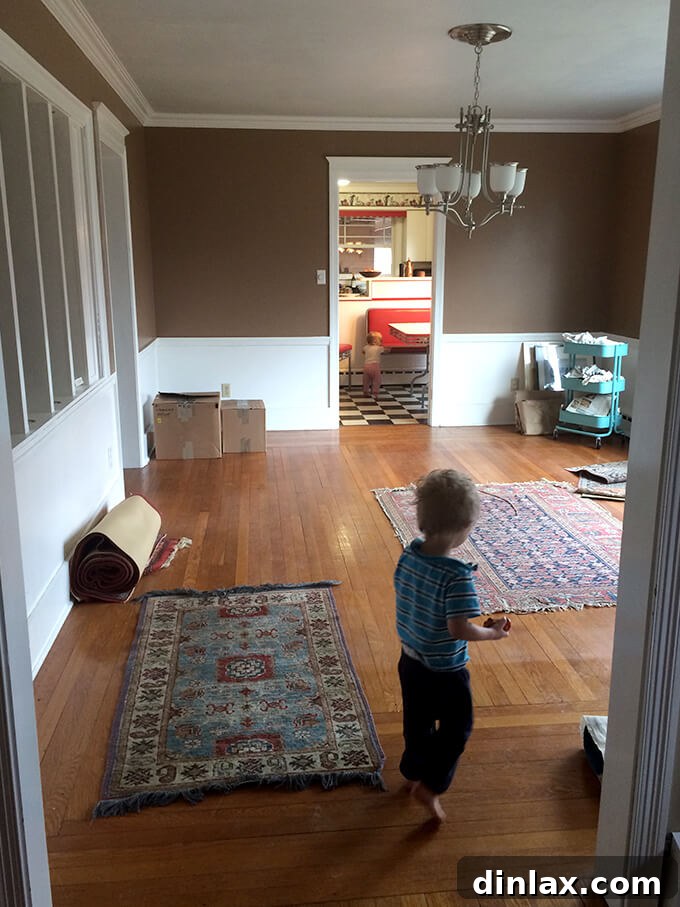 Looking into the original kitchen space, showing the full extent of the red banquet and cabinetry. Another angle of the original kitchen with red banquet