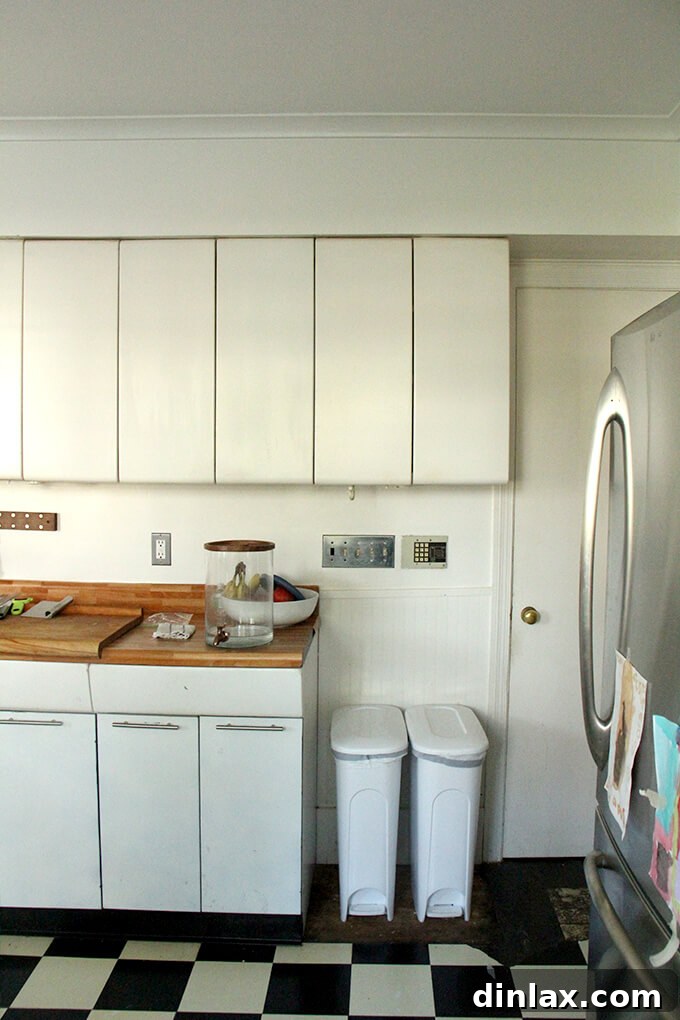 Another perspective inside the old kitchen, showcasing elements destined for transformation in the remodel. Old kitchen interior before renovation, highlighting areas for improvement