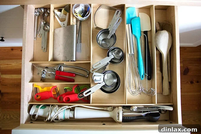 A neat and tidy kitchen drawer, possibly for smaller kitchen gadgets or baking tools.