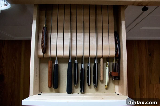 Detail of kitchen flooring, highlighting the texture and character of reclaimed heart pine.