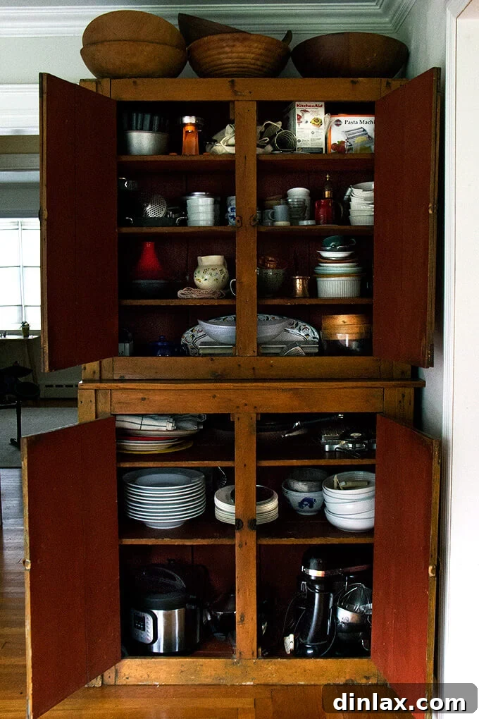 Panoramic view of the completed kitchen, bright, functional, and inviting.
