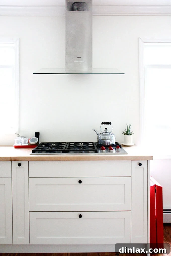 Detail shot of kitchen storage, possibly showing a pull-out or organized drawer.