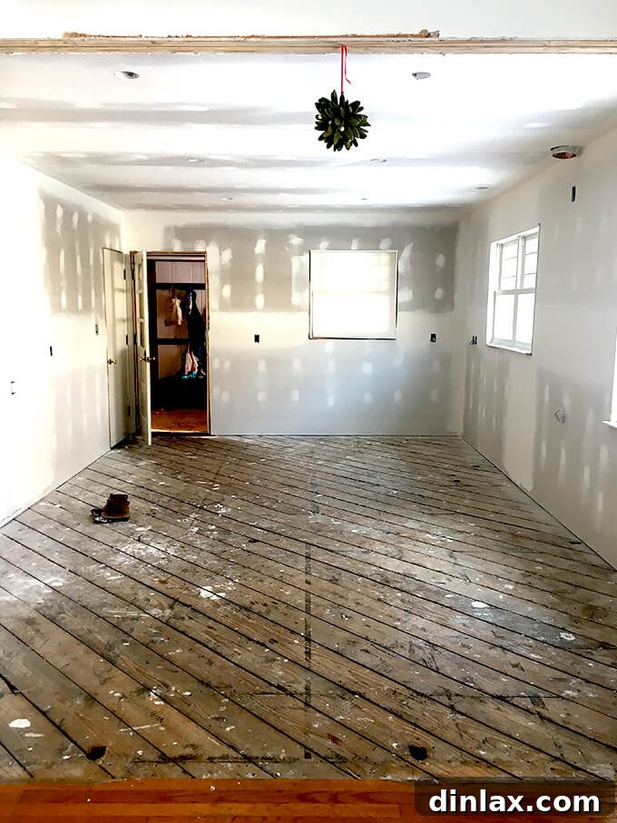 Mistletoe hanging amidst kitchen renovation, adding a festive and personal touch to the construction