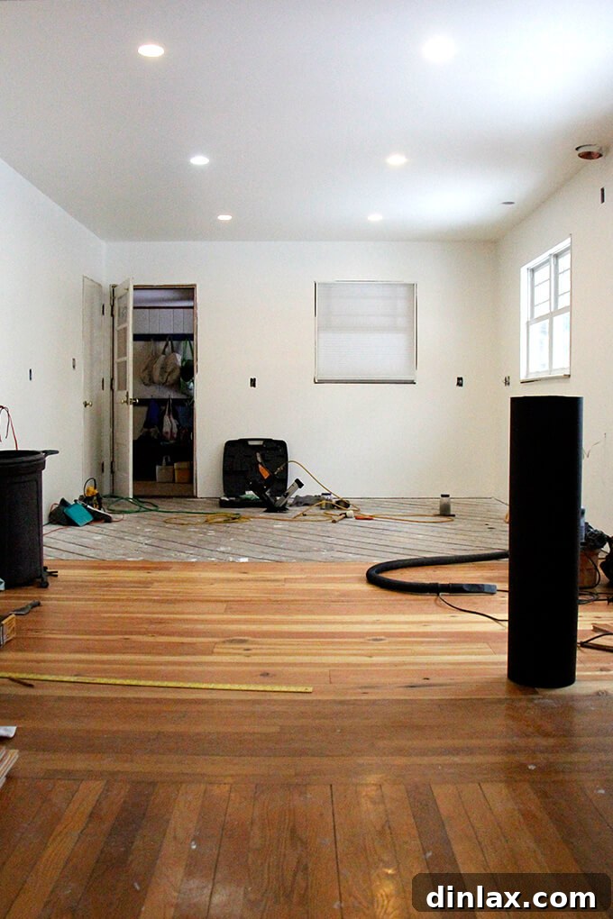 New kitchen flooring being installed, providing a durable and stylish foundation for the space