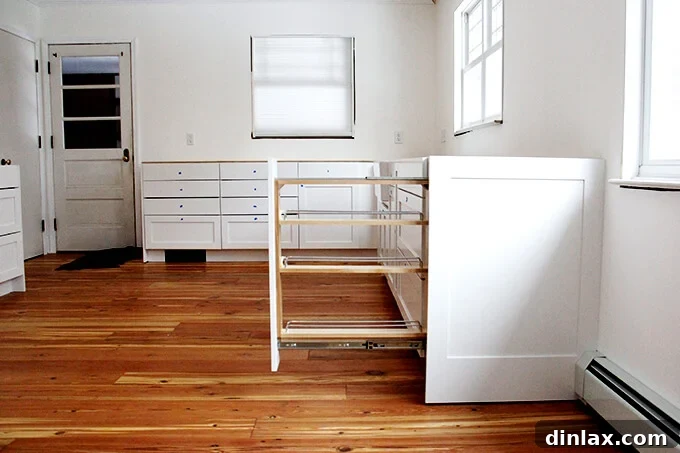 Custom spice drawer with organized compartments, showcasing efficient kitchen storage solutions