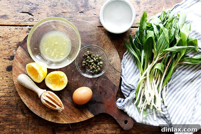 Whip Up Classic Garlic or Ramp Aioli 3 A board with the ingredients to make homemade aioli.
