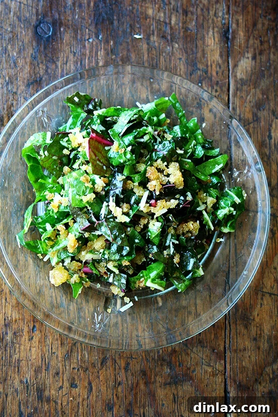 Flavorful Swiss chard salad with lemon, Parmesan cheese, and crispy breadcrumbs.