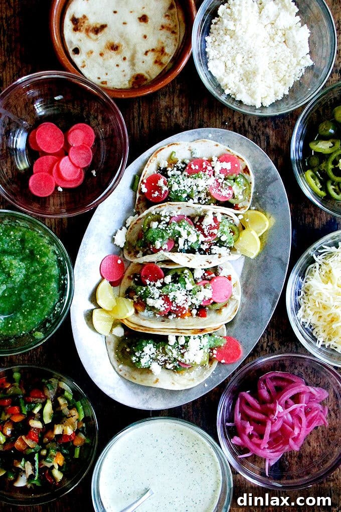 Dry-grilled vegetable tacos with tomatillo salsa and cilantro-lime crema