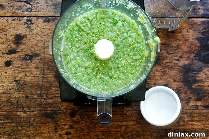 Smooth tomatillo salsa in a food processor
