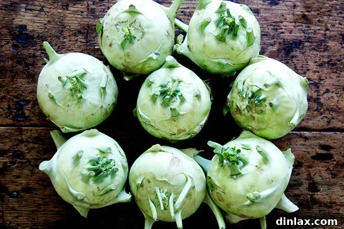 8 kohlrabi bulbs on a table, ready for preparation. Freshly harvested for a delicious salad.