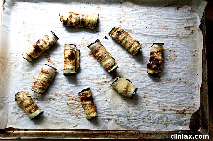 Eggplant slices rolled into coils with ricotta filling.