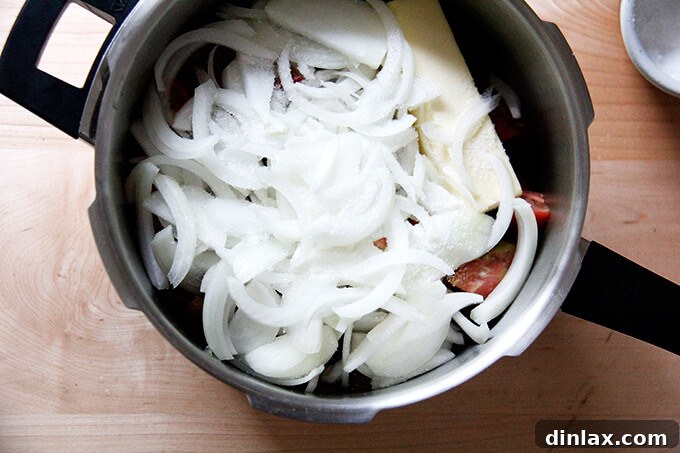 Pressure cooker lid being closed.