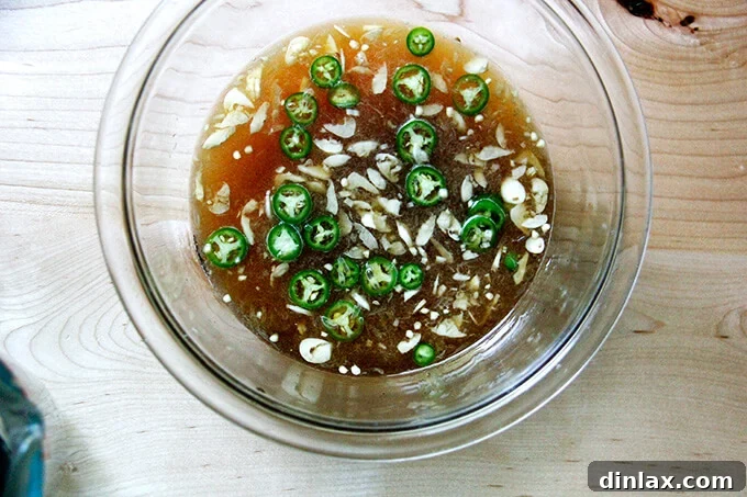 A bowl filled with homemade nuoc cham.