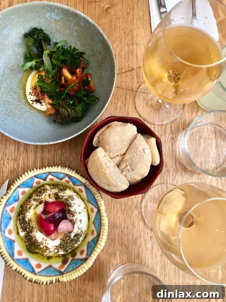 Parisian Gems 12 A beautifully presented savory dish at Mokonuts, showcasing fresh ingredients and vibrant colors.