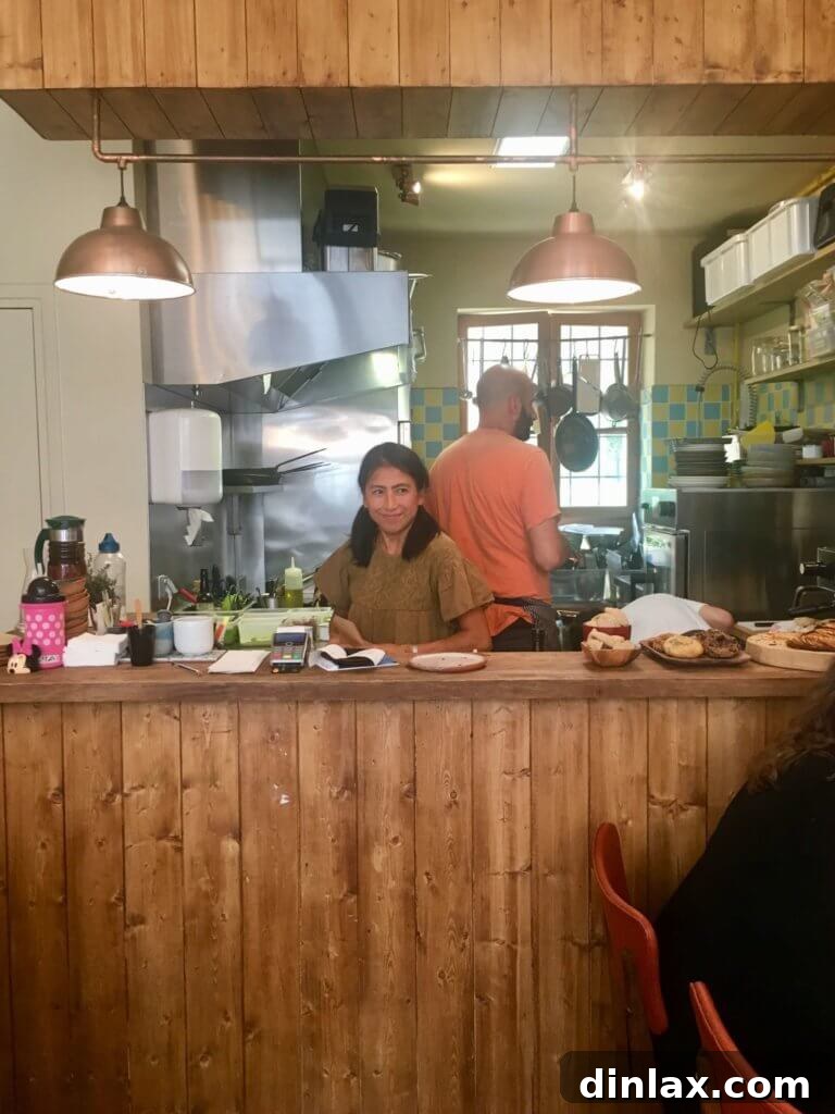 Parisian Gems 15 Moko Hirayama, the baker and co-owner of Mokonuts, smiling in her kitchen.