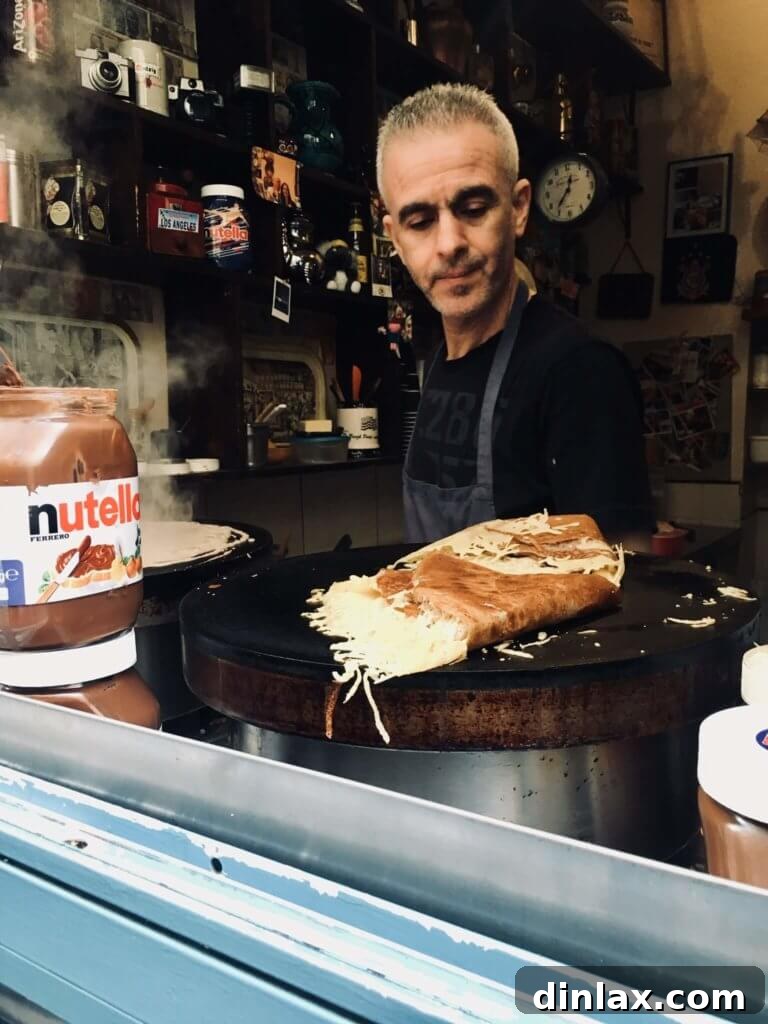 Parisian Gems 35 The interior of La Droguerie, showing its cozy ambiance and preparation area.