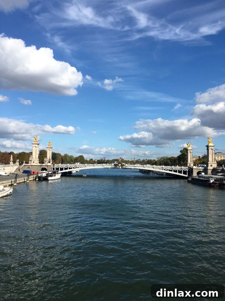 Parisian Gems 5 A charming Parisian cafe with outdoor seating, inviting passersby to relax.