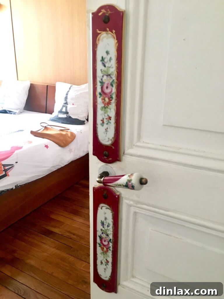 Parisian Gems 60 The interior of a cozy Parisian Airbnb apartment.