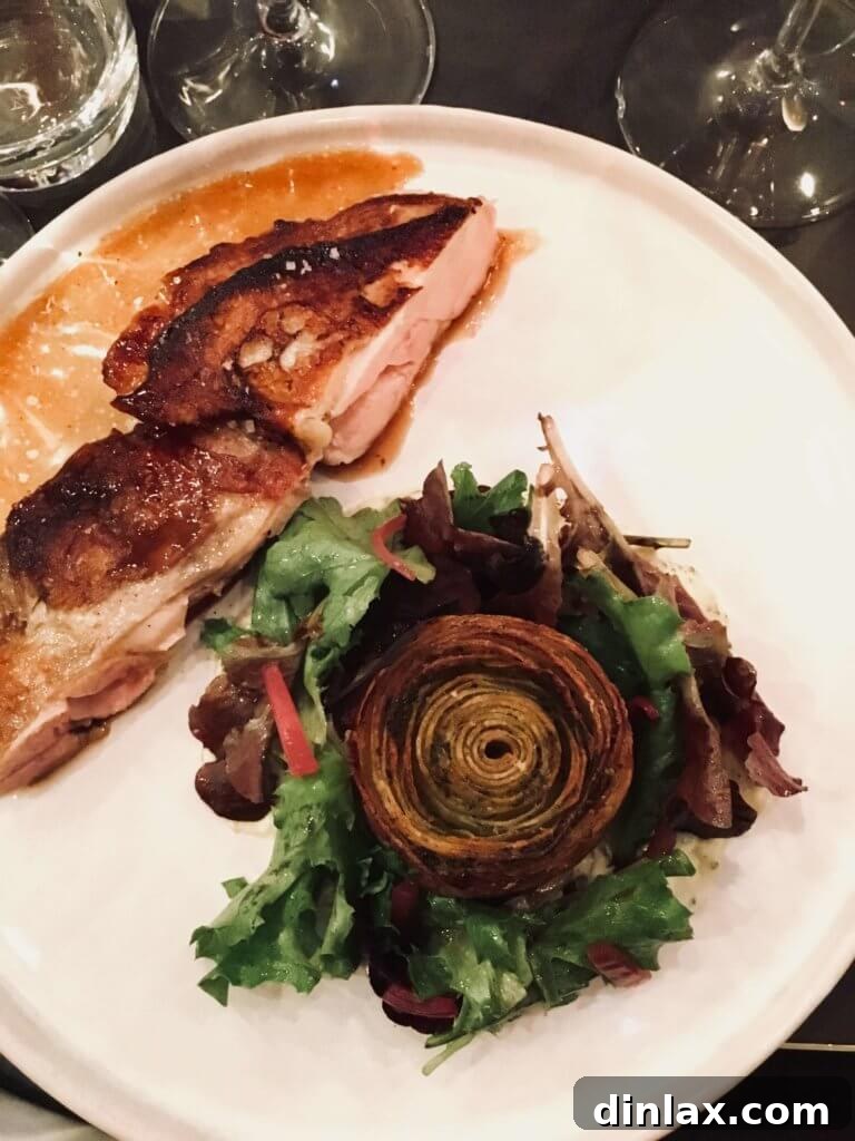 Parisian Gems 69 The table setting at Racines des Prés, showcasing elegant simplicity.