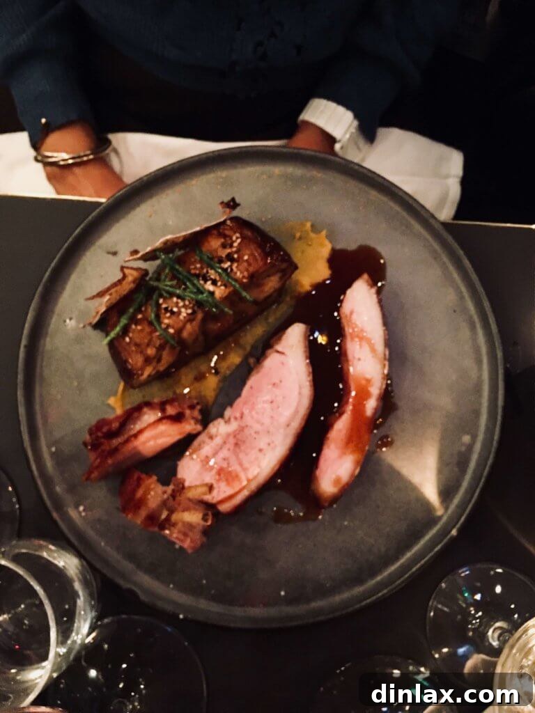 Parisian Gems 70 A close-up of a meticulously crafted dish at Racines des Prés.