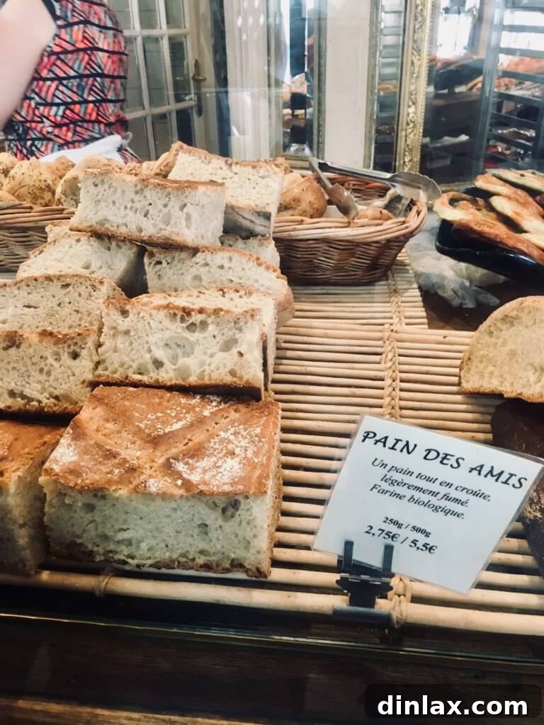 Parisian Gems 9 Display of various artisanal breads and pastries at Du Pain et des Idées.