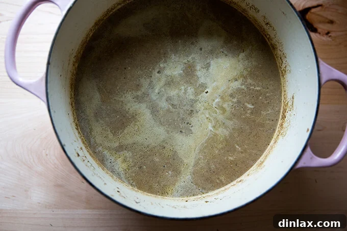 Margaret Roach: Soup, Stories, and So Much More 6 A bowl of creamy, unadorned soup, waiting for a vibrant garnish to complete its presentation.