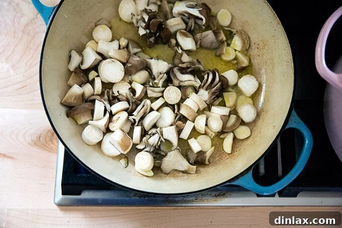 Margaret Roach: Soup, Stories, and So Much More 7 A creamy soup, artfully garnished with sautéed king and hen of the wood mushrooms, enhancing its visual appeal.