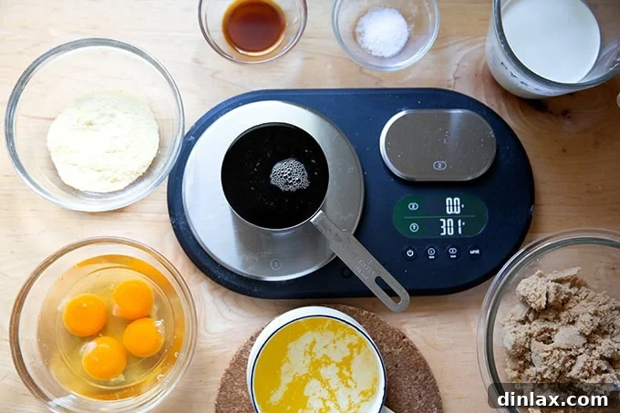 Sister Pie's Irresistible Salted Maple Pie 4 A digital kitchen scale surrounded by measuring cups and ingredients for salted maple pie, emphasizing precise measurement.