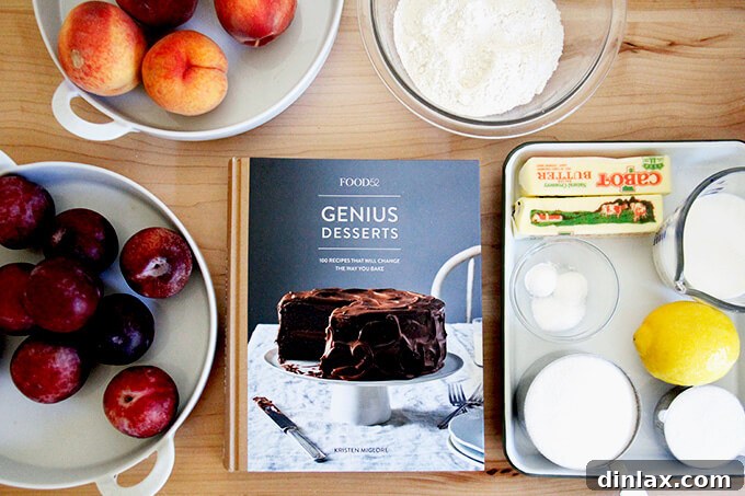 A delicious peach cobbler with a hot sugar crust, a recipe from Kristen Miglore's Genius Desserts cookbook.